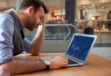 3PL warehouse worker concerned about an economic recession