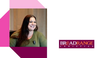 Person in a green top with a clipped device, standing indoors with wooden paneling, next to the BroadRange Logistics logo on a purple and orange background with geometric pink and maroon accents.