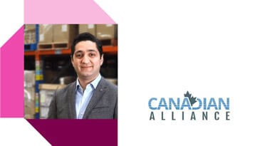 Person in a warehouse setting wearing a suit jacket, standing beside the Canadian Alliance logo with a maple leaf design and geometric pink and purple accents.