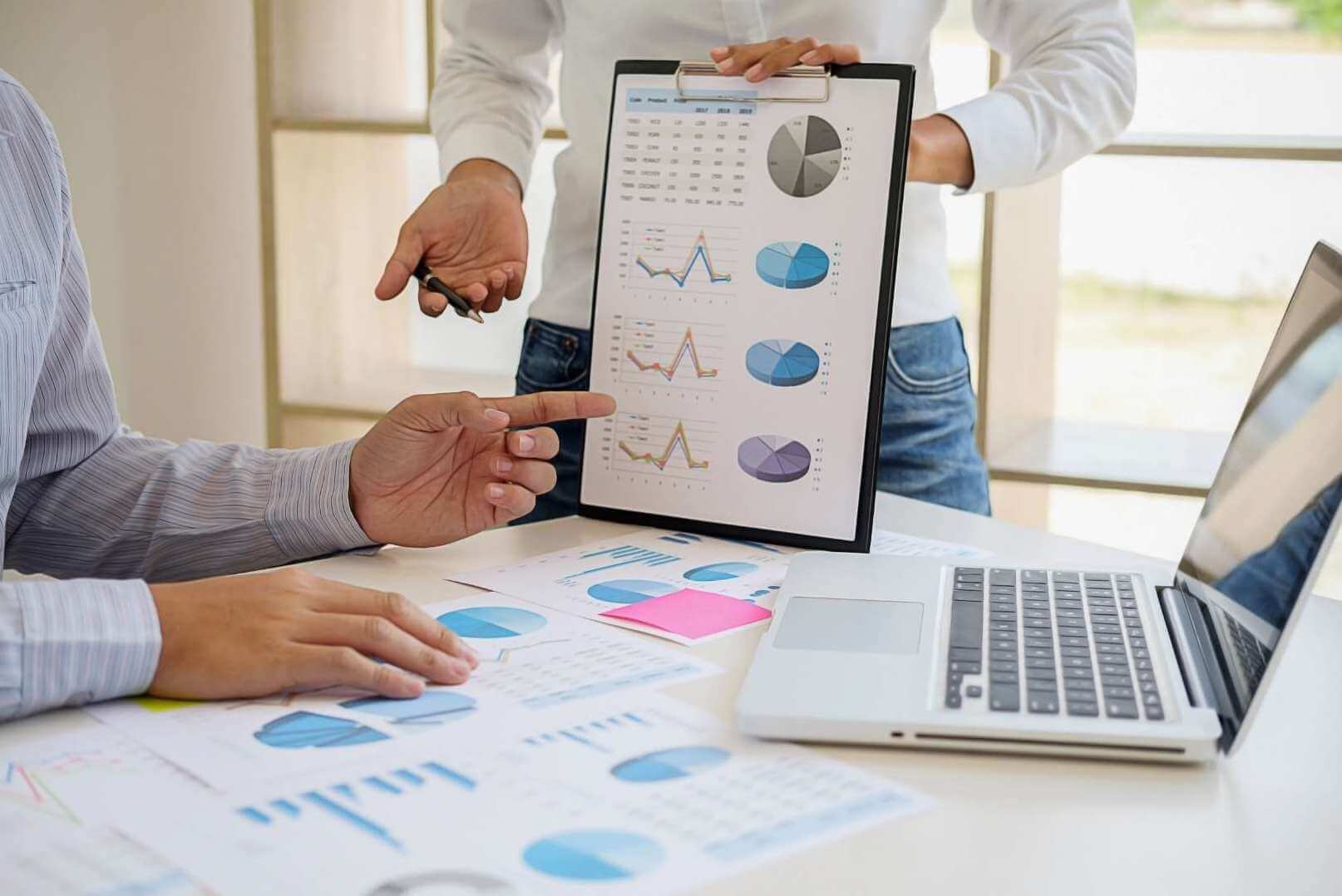 Adviser analyzing financial figures