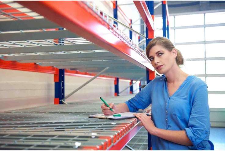 Female Worker Writing Inventory