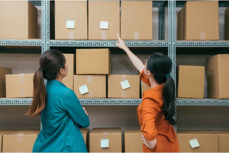 Workers looking at parcels