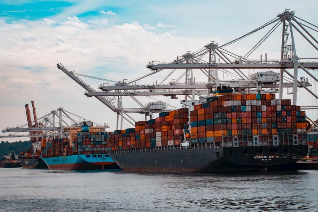 Shipping containers on a barge. Blind shipping