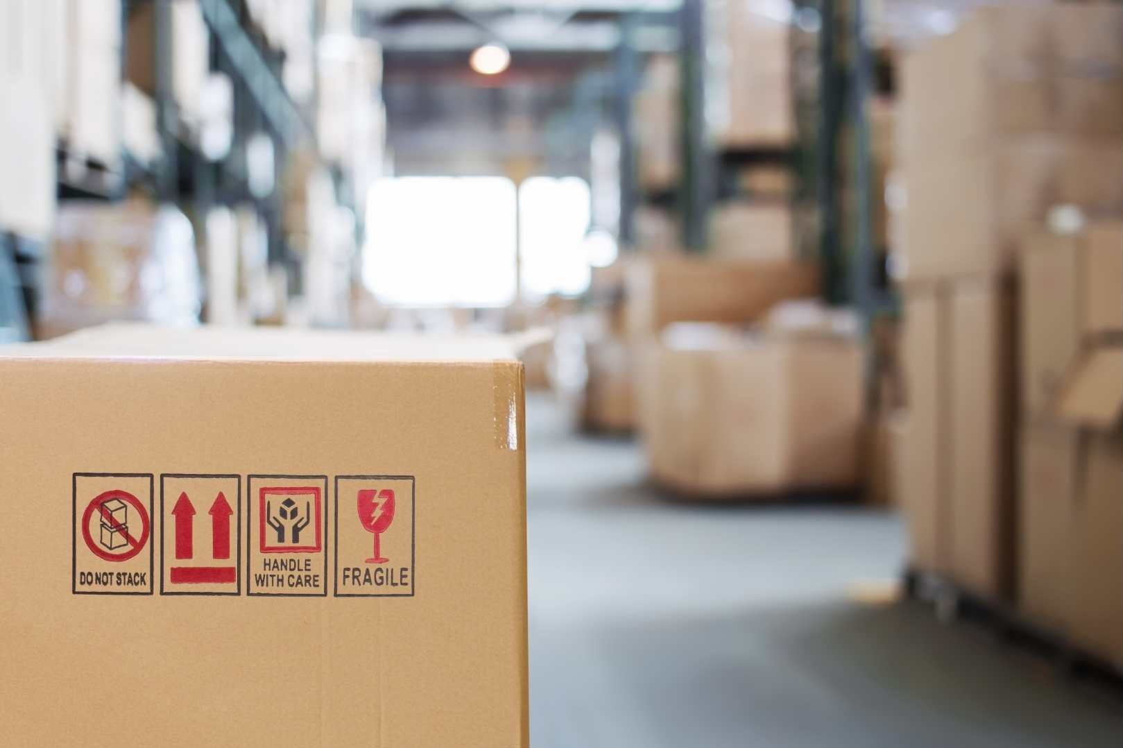 cardboard box with goods on the background