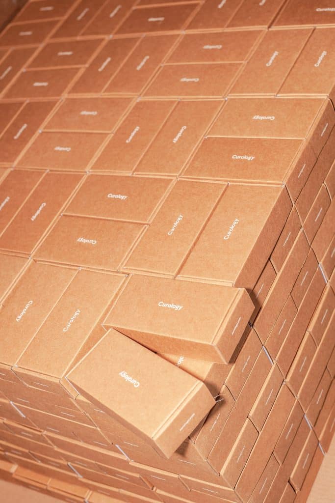 Stack of trendy e-commerce packaging.