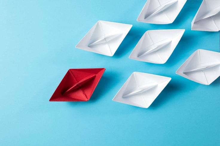 leadership-concept-using-origami-ship-SZR2C36