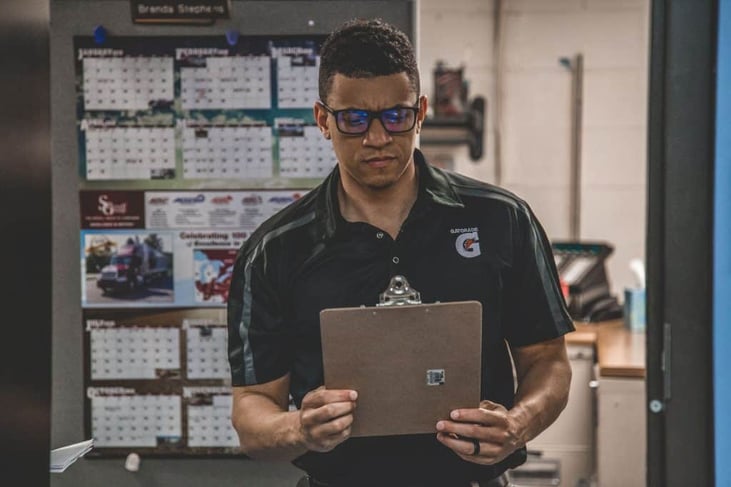 Man strategizing about a lean warehouse.