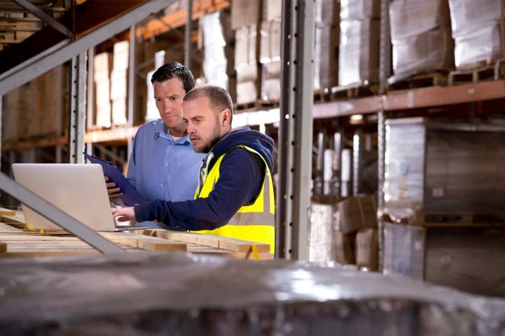 warehouse workers checking inventory