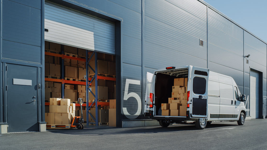 Delivery Van Loaded with Cardboard Boxes from warehouse