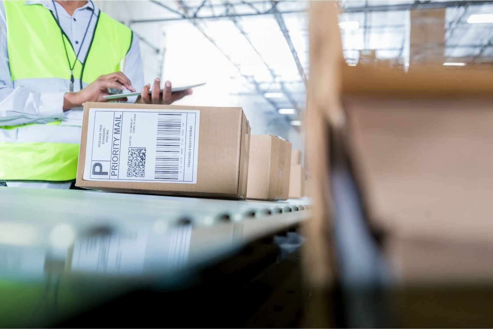 worker processing orders in distribution warehouse