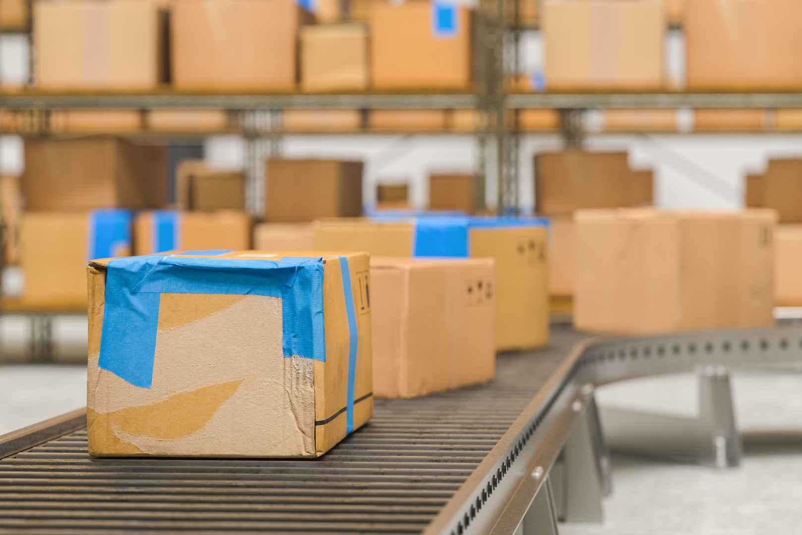 parcels in conveyor belt in distribution warehouse