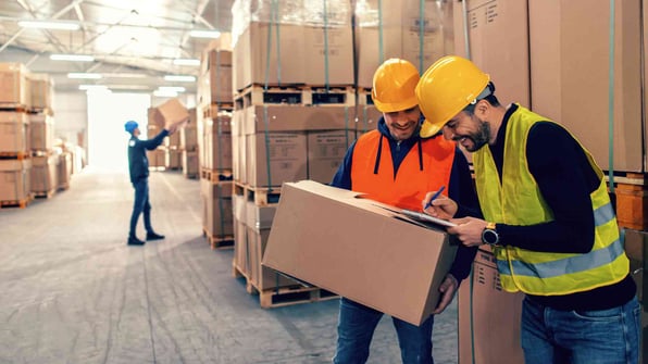 warehouse workers checking inventory