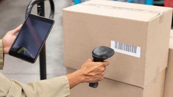 warehouse worker scan barcode